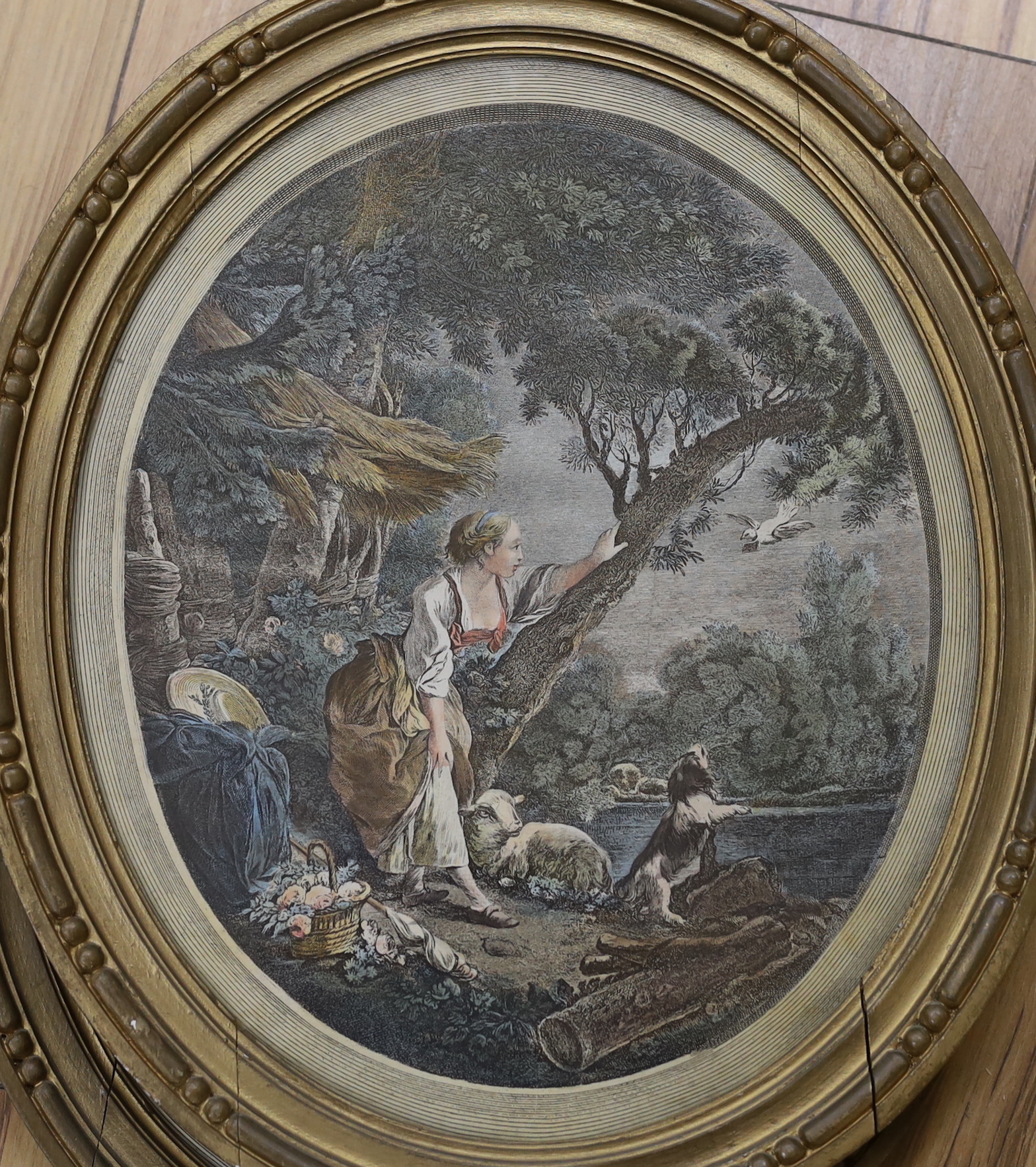 After Francois Boucher (French, 1703-1770), pair of oval colour engravings, ‘Dispatch of the Messenger’ and ‘Arrival of the Dove’, 36 x 30cm
